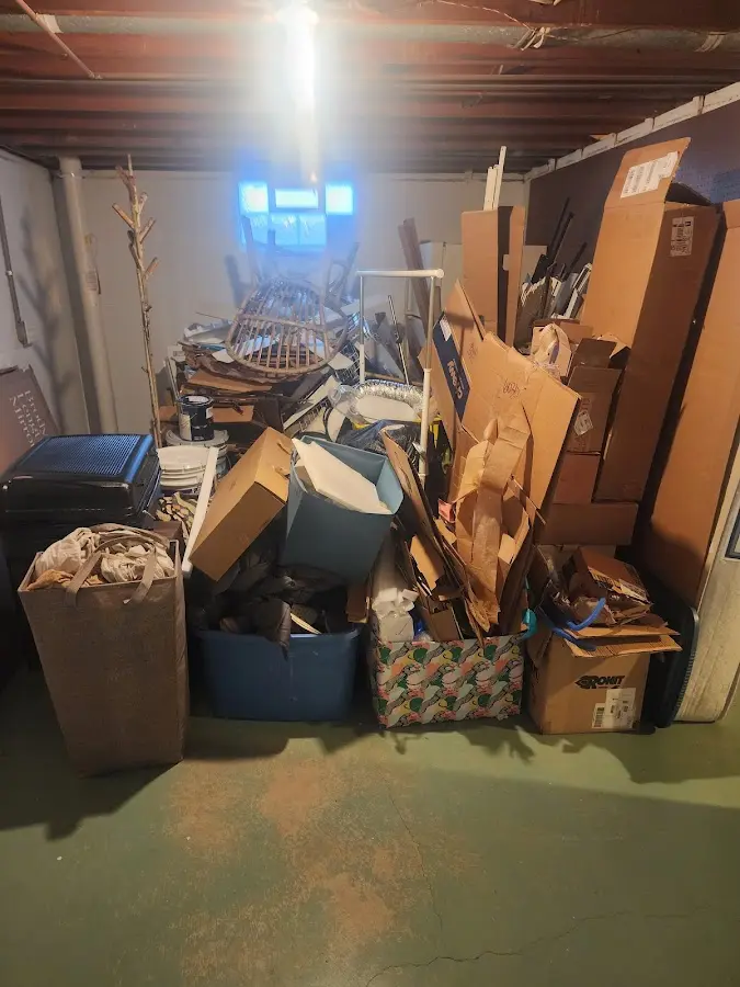 Roll-off dumpster container at job site for 2 Yard Dumpster Rental in Carterville